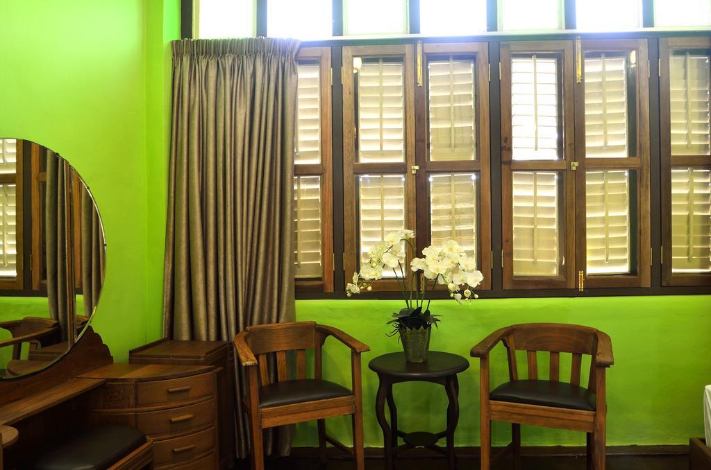 Yong Yi Yuen Guesthouse George Town Habitación foto