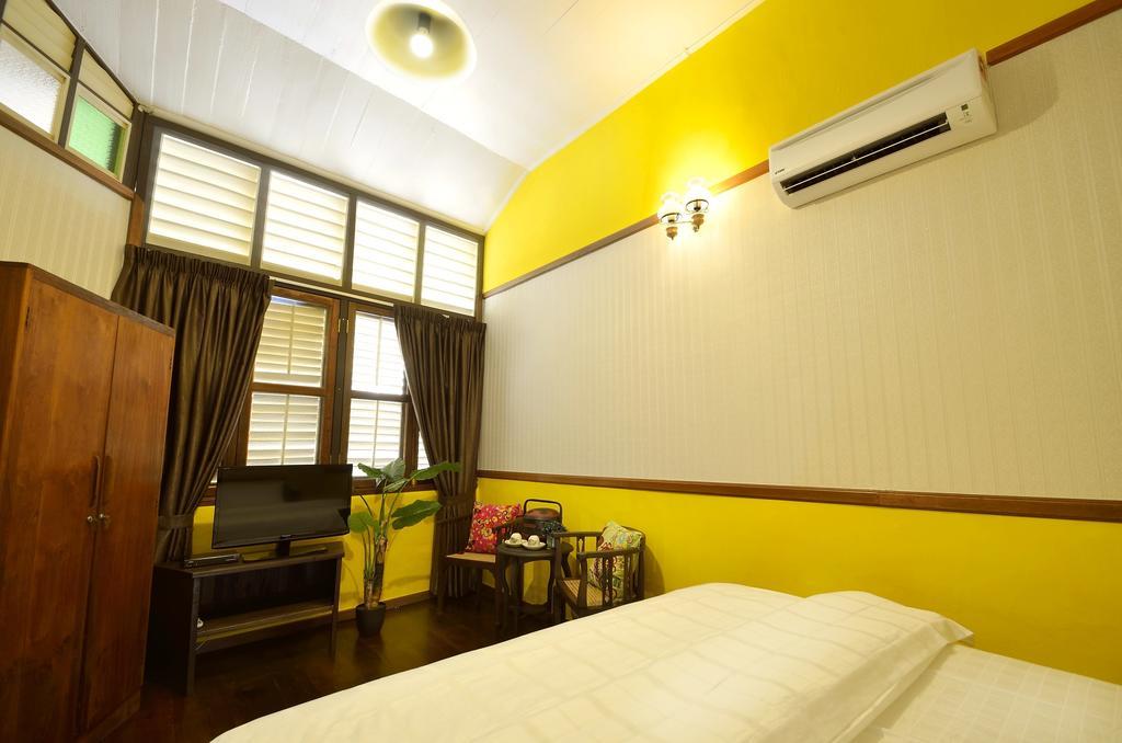 Yong Yi Yuen Guesthouse George Town Habitación foto