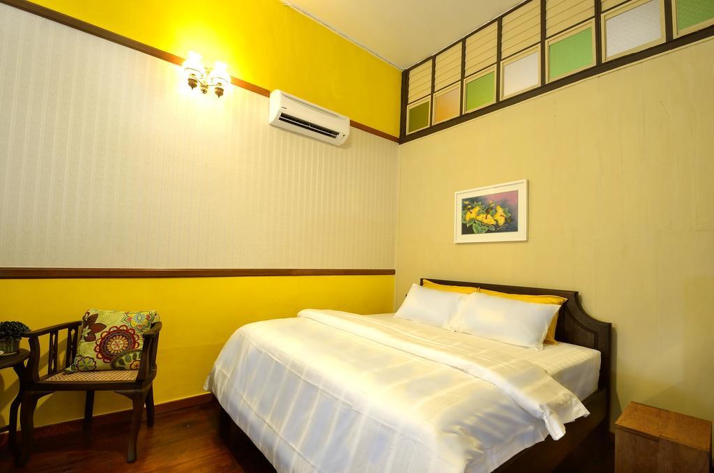 Yong Yi Yuen Guesthouse George Town Habitación foto